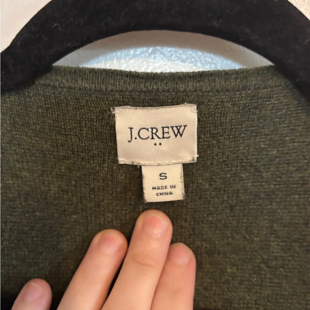J Crew cardigan size small, has pockets and small stain shown